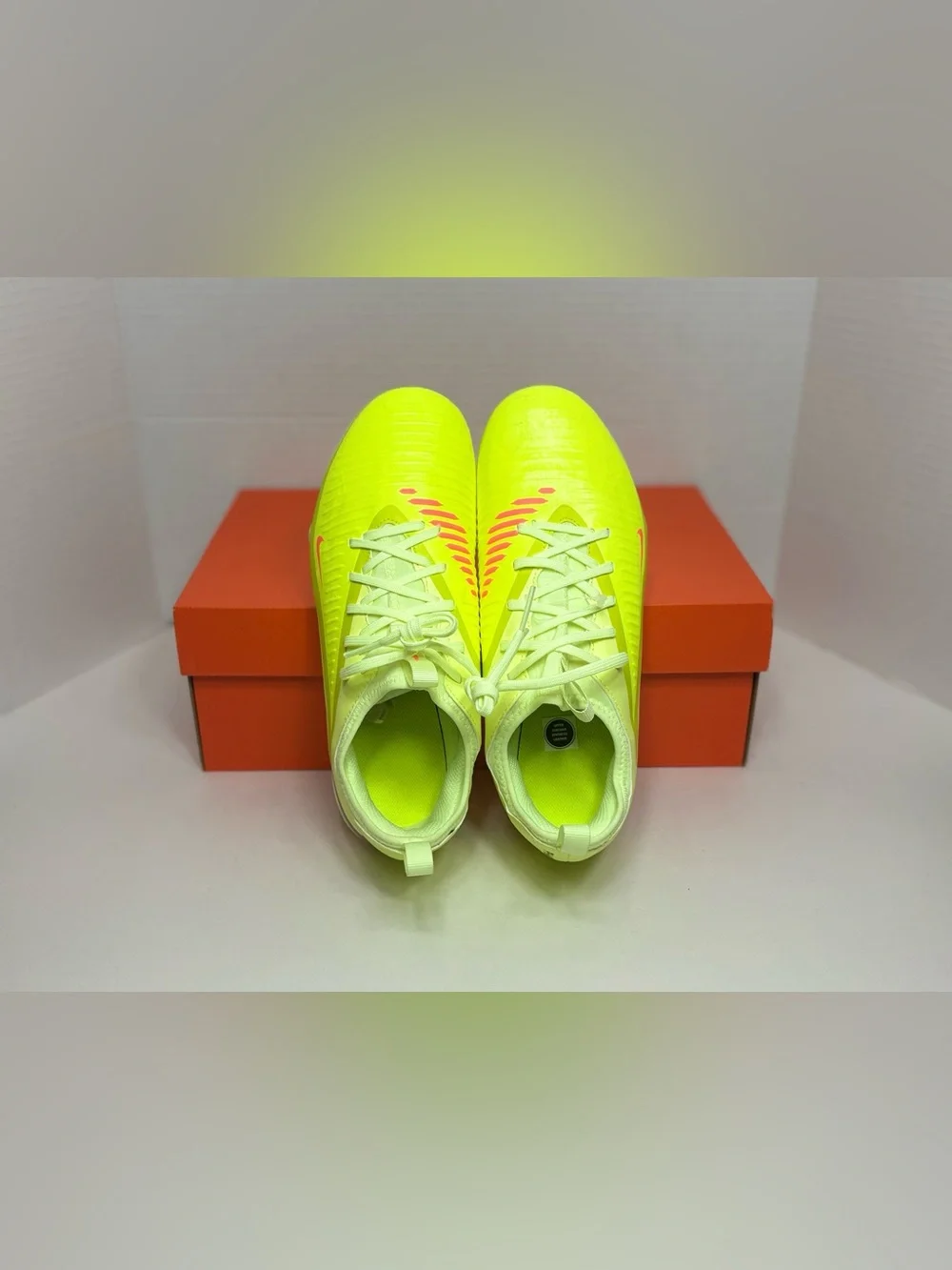 Nike Neon Yellow Soccer Cleats with Orange and Black Accents